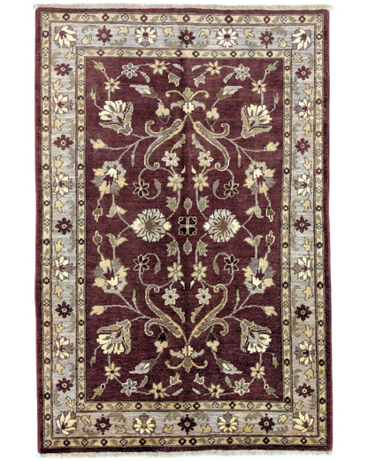 Tappeto Ziegler rosso mattone e beige, annodato a mano in Afghanistan. Realizzato in lana e cotone con colori vegetali, unisce raffinatezza floreale e tradizione artigianale.