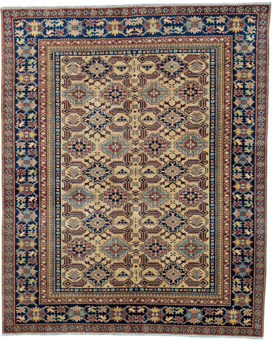 Tappeto Shirvan beige con cornice blu e motivi geometrici, annodato a mano in Afghanistan in pura lana tinta con colori vegetali.