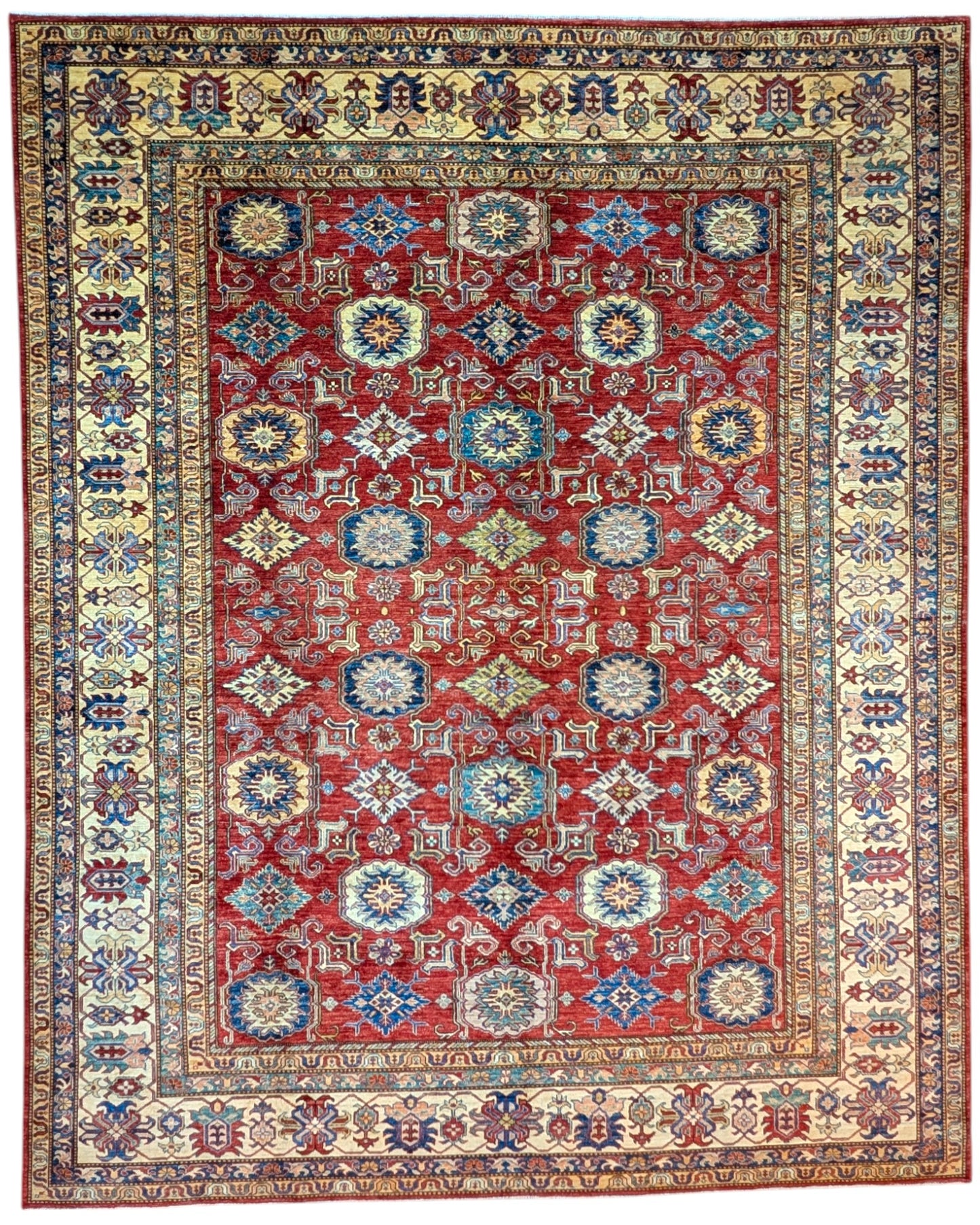 Tappeto Shirvan rosso melograno con cornice beige e motivi geometrici, annodato a mano in Afghanistan con lana e cotone tinti con colori vegetali.