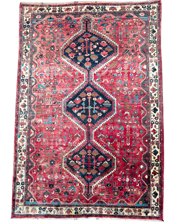 Tappeto Hamedan "Giardino Persiano" rosso melograno con motivi geometrici e floreali, annodato a mano in Persia.
