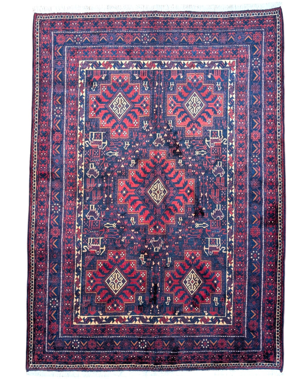 Tappeto Lorestan nero con simboli e motivi della mitologia persiana, annodato a mano in lana con colori vegetali.