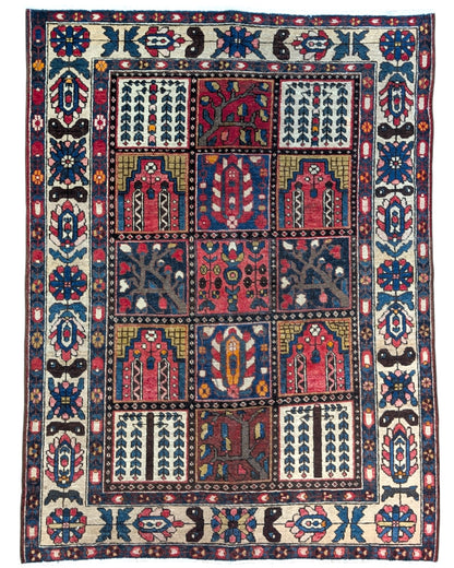 
Tappeto Bakhtiyari annodato a mano, 196 x 148 cm, fondo rosso mattone con pannelli geometrici e stilizzati.