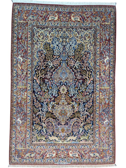 Tappeto Isfahan annodato a mano, 221 x 147 cm, fondo blu con disegno decorativo in seta e lana.