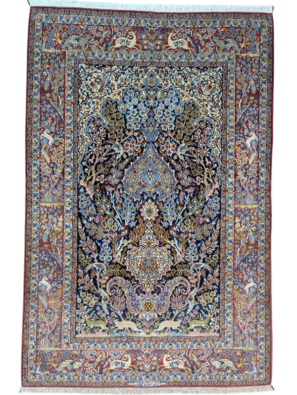 
Tappeto Isfahan annodato a mano, 221 x 147 cm, fondo blu con disegno decorativo in seta e lana.