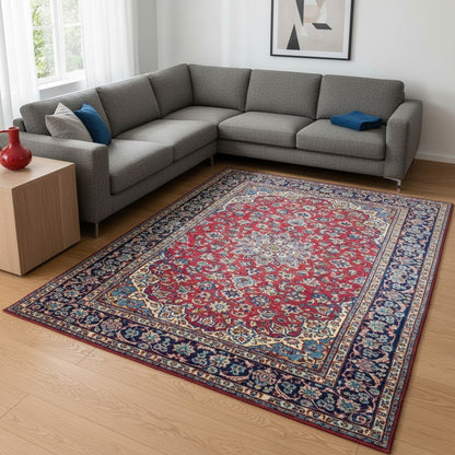 Tappeto Najafabad persiano 350x231 cm, annodato a mano in lana e cotone con colori vegetali, fondo rosso e dettagli blu e avorio.