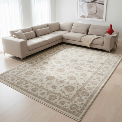Tappeto Farahan Ziegler beige chiaro con motivi floreali e decorativi, annodato a mano in Afghanistan con lana e cotone tinti con colori vegetali.