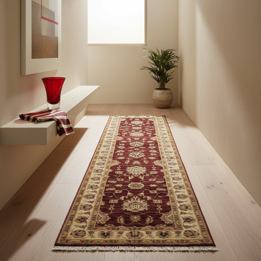 Passatoia Ziegler 309x83 cm in lana, annodata a mano, fondo rosso melograno con cornice beige.