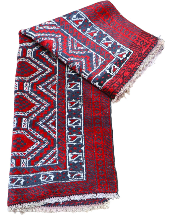 tappeto baluchistan 147x90 cm fatto a mano con motivi geometrici su fondo rosso