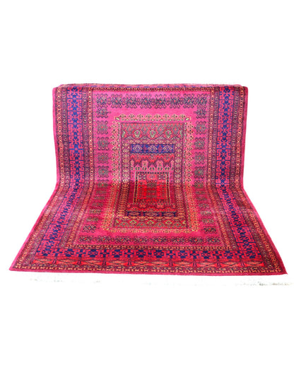 Tappeto Turkemen 278x185 cm con motivo geometrico ricco di rosa, blu e giallo, annodato a mano con lana di alta qualità e ordito in cotone resistente.