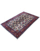 Tappeto Isfahan floreale avorio 215x138 cm in camera da letto