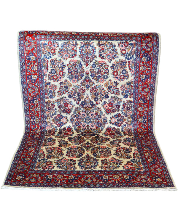 Tappeto Isfahan avorio 215x138 cm con disegni floreali in salotto raffinato