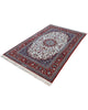 Tappeto Isfahan floreale avorio 238x154 cm in sala da pranzo