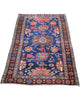 Tappeto persiano con sfondo blu e motivi colorati, dimensioni 150x90 cm