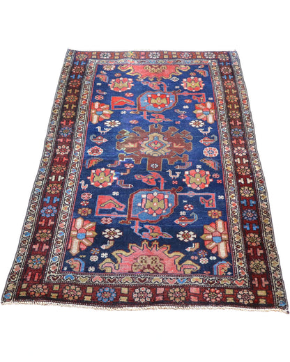 Tappeto persiano con sfondo blu e motivi colorati, dimensioni 150x90 cm