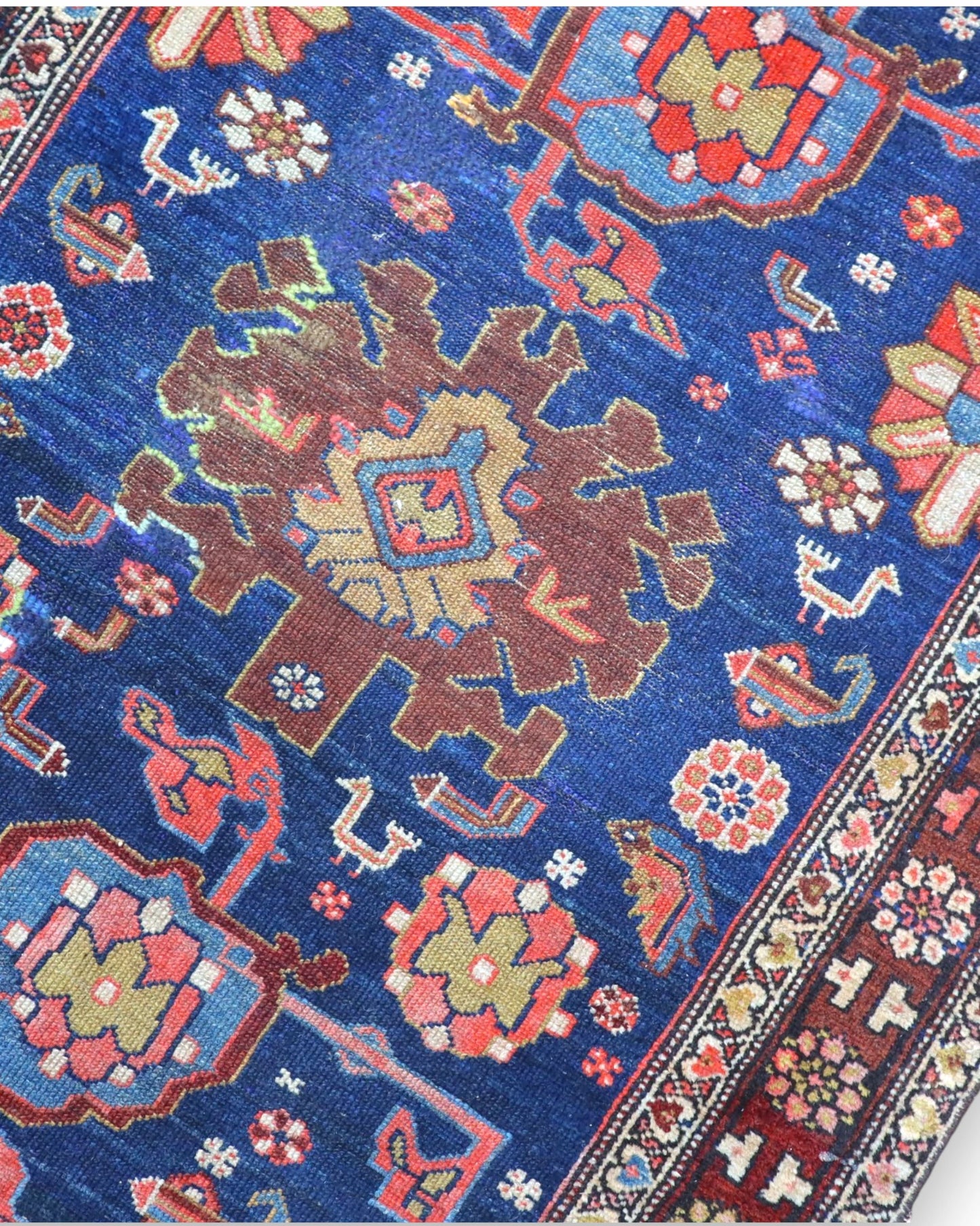 Tappeto persiano annodato a mano 150x90 cm, con tonalità calde e design floreale