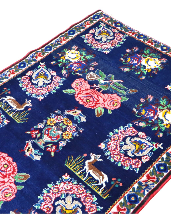 Tappeto persiano Akhtiyari 152x109 cm con fondo blu e fiori colorati