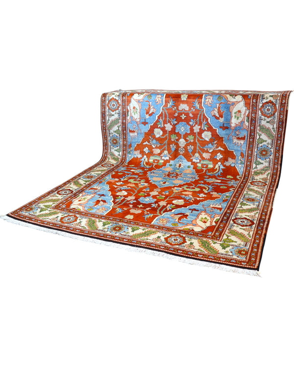 Tappeto Heriz 240x320 cm persiano annodato a mano con fondo rosso e dettagli azzurri e avorio.