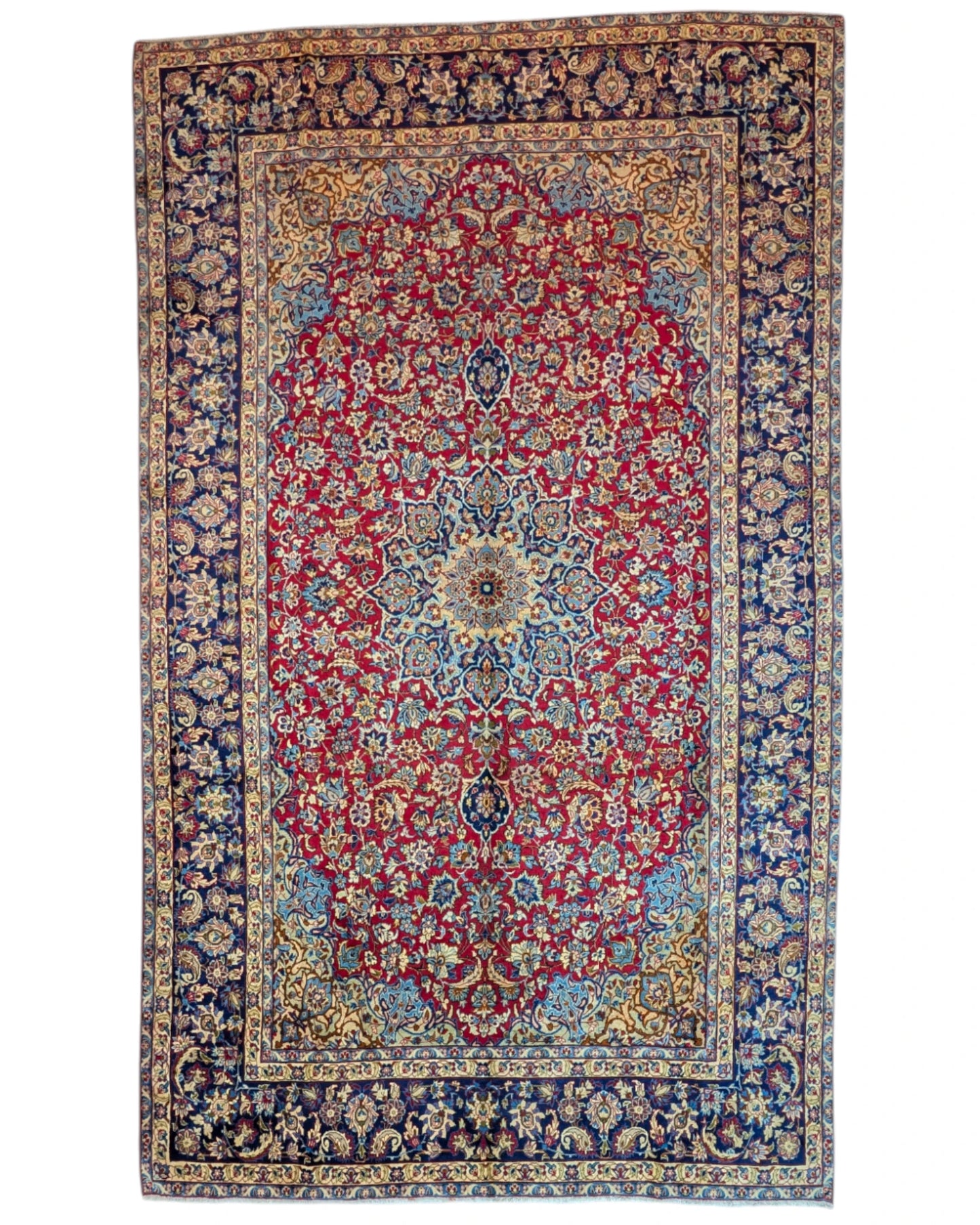Tappeto persiano Najafabad 500x400 cm, fondo rosso con ampio medaglione centrale blu e cornice floreale scura, annodato a mano in lana vegetale.
