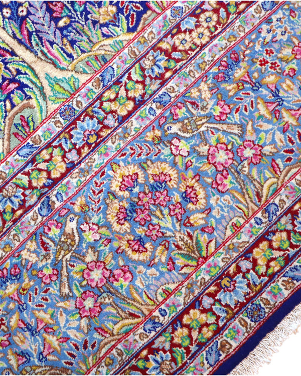 Tappeto Tabriz persiano 486x357 cm rettangolare, annodato a mano, con motivo floreale fitto multicolore su fondo azzurro e blu.