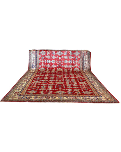 Tappeto Kazak 445x307 cm afghano, annodato a mano, con fondo rosso e motivi geometrici in azzurro, avorio e oro.