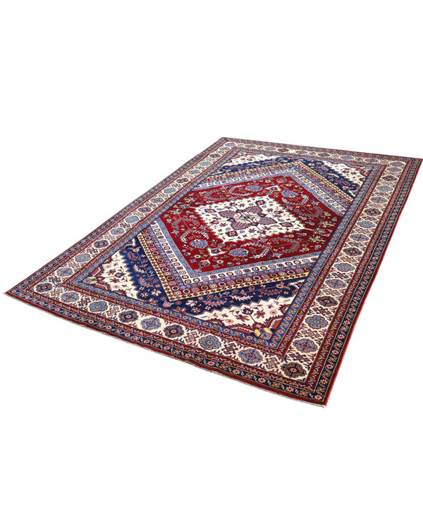 Tappeto Shirvan 274x184 cm con fondo rosso, medaglione centrale blu e avorio e bordure geometriche multicolori, tramato ed annodato a mano.