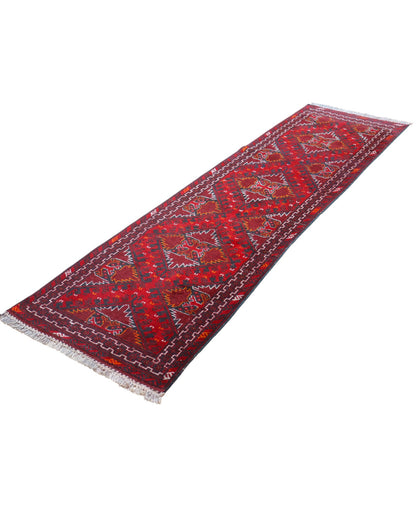 Tappeto Turkman 267x76 cm, corridore persiano in lana annodata a mano, fondo bordeaux con motivi geometrici rossi e arancio.