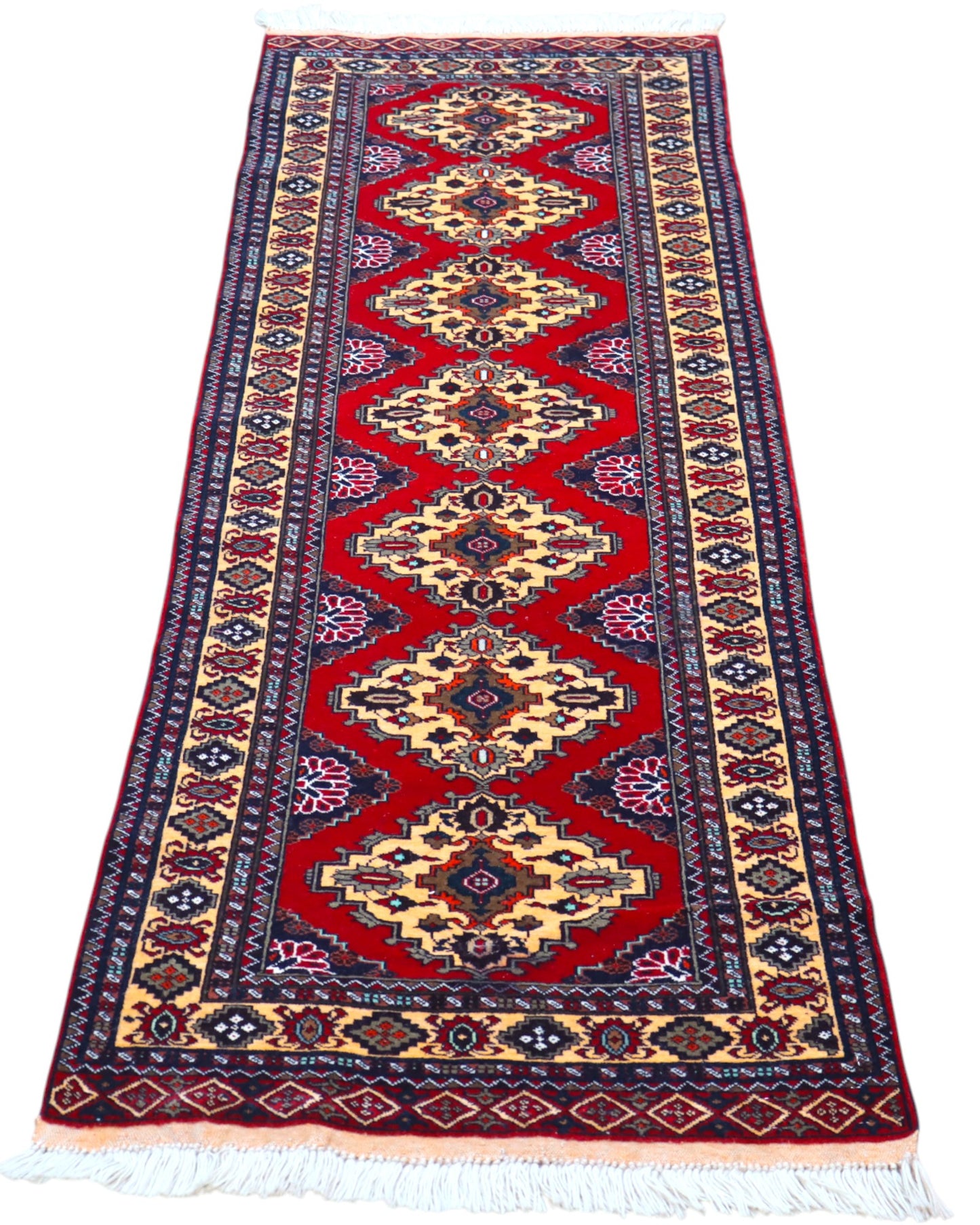 Tappeto Turkman persiano 192x70 cm, corridore con fondo rosso e rombi centrali avorio, annodato a mano in lana.
