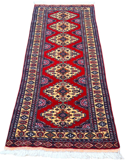Tappeto Turkman persiano 192x70 cm, corridore con fondo rosso e rombi centrali avorio, annodato a mano in lana.