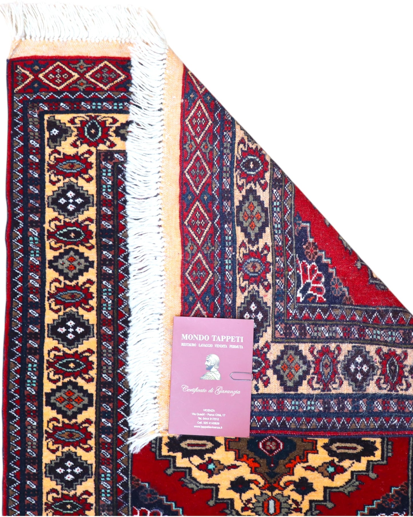 Tappeto Turkman persiano 192x70 cm, corridore con fondo rosso e rombi centrali avorio, annodato a mano in lana.