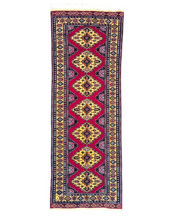 Tappeto Turkman persiano 192x70 cm, corridore con fondo rosso e rombi centrali avorio, annodato a mano in lana.