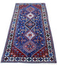 Tappeto persiano Yalameh 204x82 cm, corridore con fondo blu intenso e motivi geometrici rossi, avorio e verdi, annodato a mano in lana vegetale.