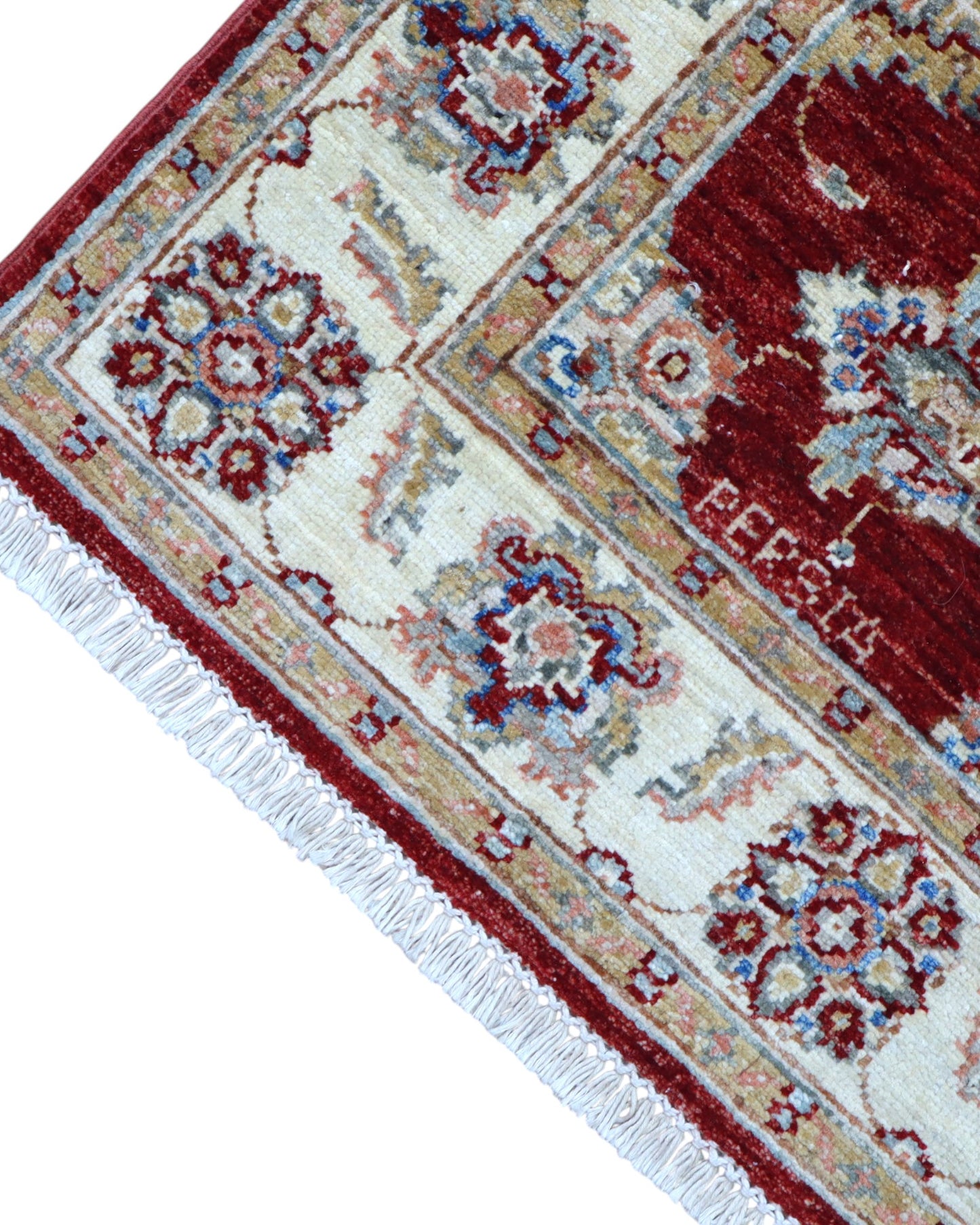 Tappeto Ziegler Afghan 199x83 cm annodato a mano, fondo rosso intenso con decorazioni floreali avorio e cornice chiara.