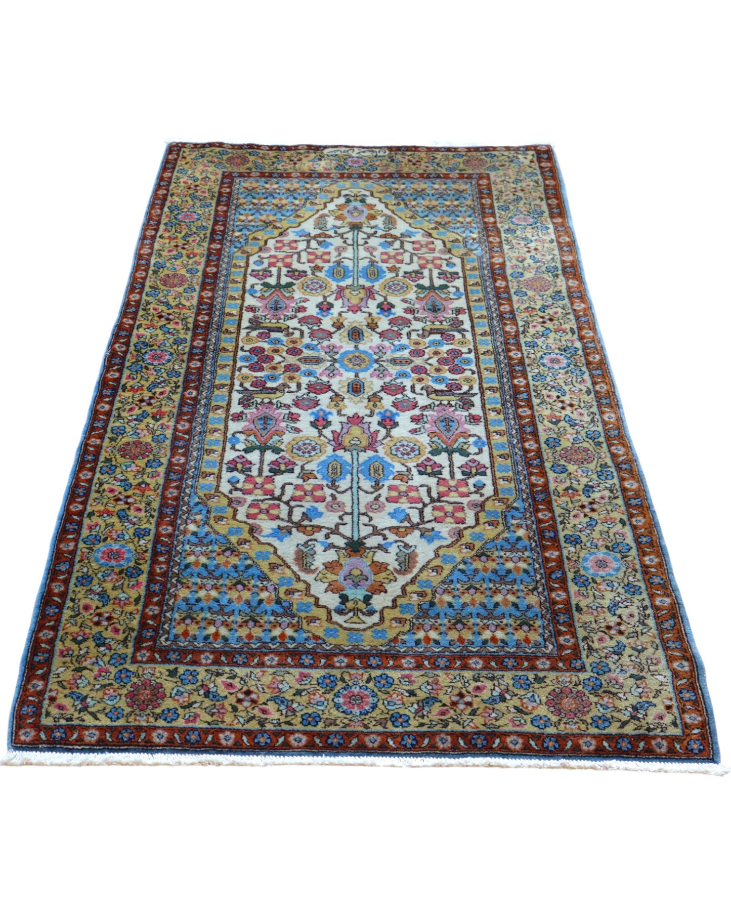 Tappeto Transilvania Romania 198x101 cm annodato a mano, fondo avorio con motivi floreali multicolore e cornici blu e rosse.