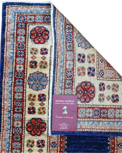 Tappeto Kazak 237x79 cm fondo blu annodato a mano in lana e cotone.