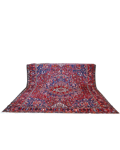 Tappeto Bakhtiar persiano 380x304 cm rettangolare, annodato a mano, con campo rosso, medaglione centrale e motivi floreali blu e avorio.