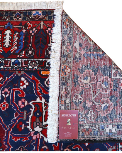 Tappeto Bakhtiar persiano 380x304 cm rettangolare, annodato a mano, con campo rosso, medaglione centrale e motivi floreali blu e avorio.