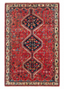 Tappeto 210x160 cm rosso corallo e blu con medaglioni per soggiorno elegante.