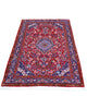 Tappeto Jozan rosso 163x106 cm con motivi floreali in salotto raffinato