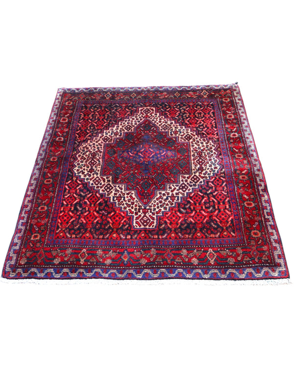 Tappeto Sanneh rosso 140x118 cm con disegno tradizionale in salotto