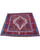 Tappeto Sanneh rosso 150x134 cm con disegno tradizionale in salotto