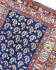 Tappeto Bakhtiyari 205x125 cm in lana con fondo blu e raffinate bordure geometriche.