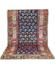 Tappeto Bakhtiyari 205x125 cm annodato a mano con motivi Boteh su fondo blu intenso.
