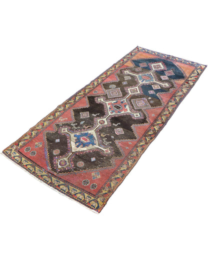 Tappeto Persiano Bakhtiyari 238x105 cm annodato a mano dal design geometrico classico.