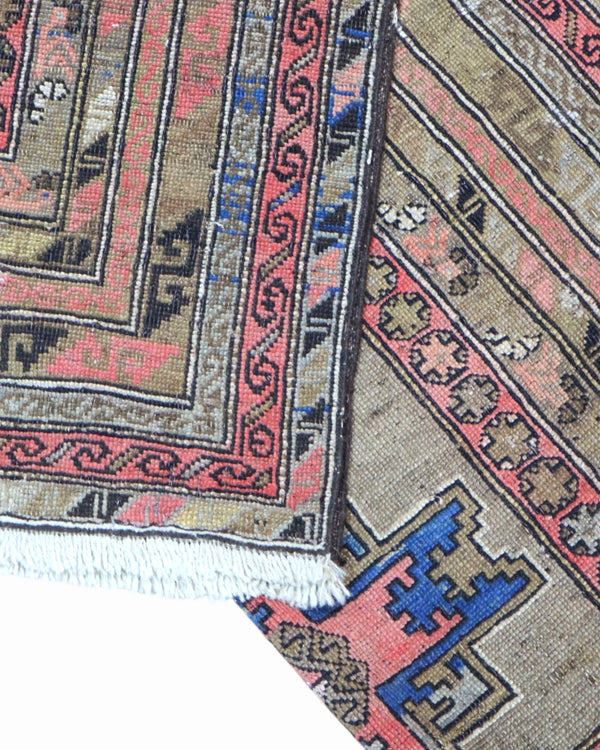 Tappeto Bakhtiyari Antico 185x117 cm in lana con bordura decorata e composizione geometrica centrale.