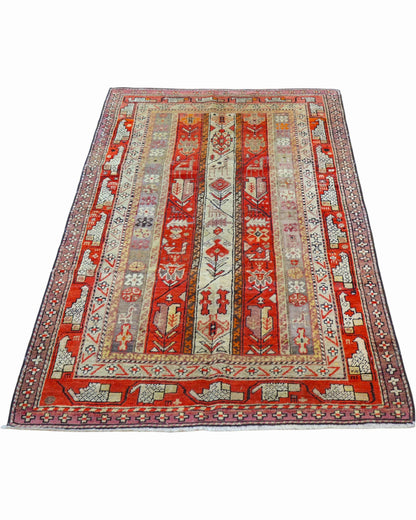 Tappeto Caucaso Antico 183x112 cm annodato a mano con fasce geometriche nei toni del rosso e avorio.