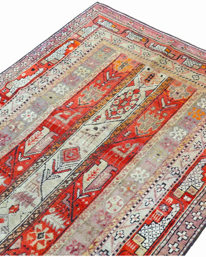 Tappeto Orientale Caucaso Antico 183x112 cm annodato a mano con design geometrico lineare.