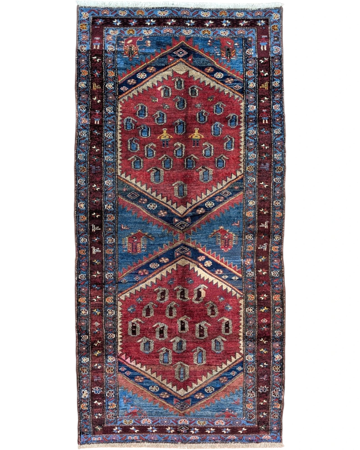Tappeto Caucaso Antico 217x107 cm in lana con design orientale nei toni del rosso e del blu.
