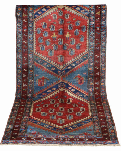 Tappeto Caucaso Antico 217x107 cm artigianale con medaglioni esagonali e raffinata bordura decorata.