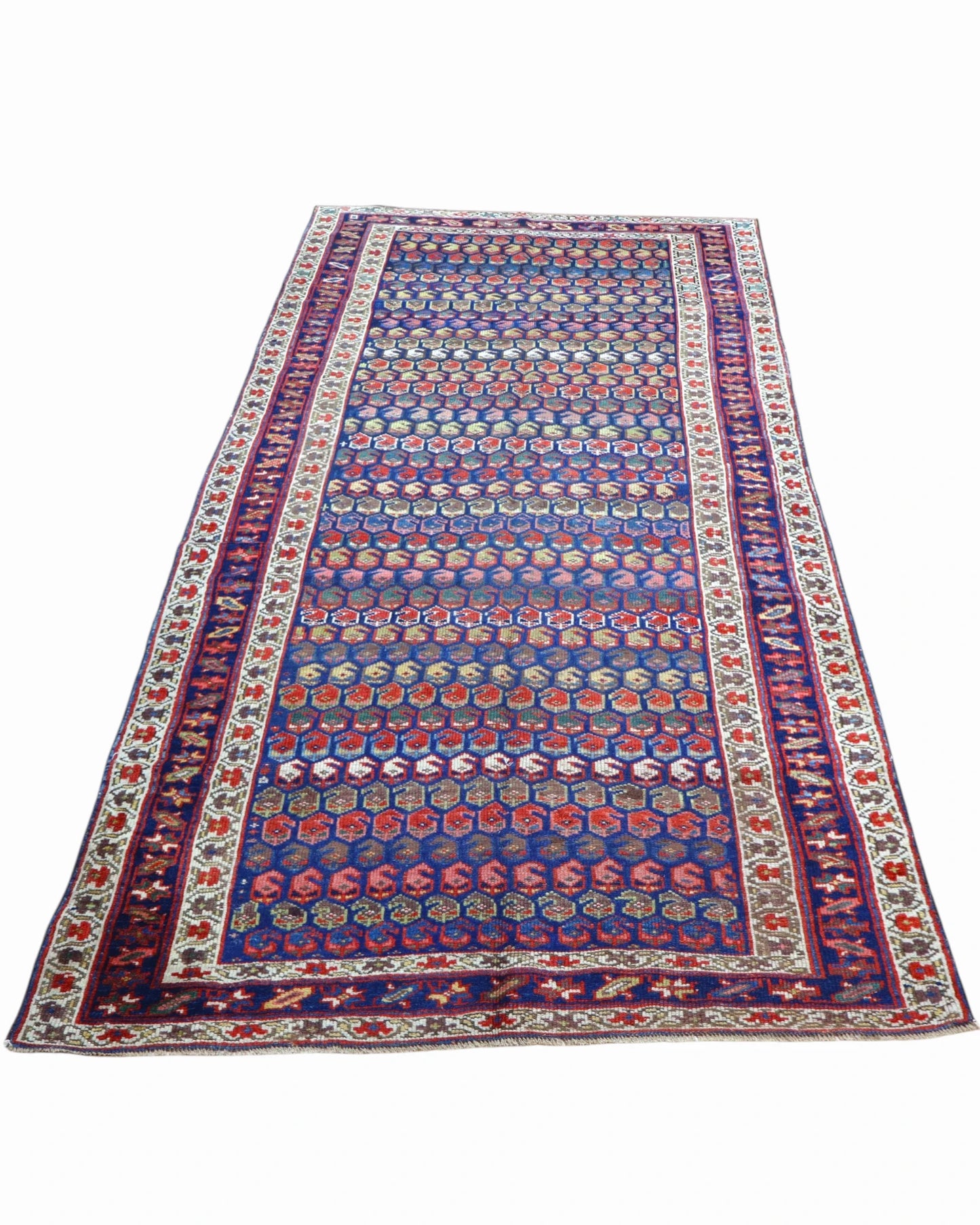 Tappeto Caucaso Antico 266x136 cm in lana con bordure decorate e raffinato motivo geometrico.