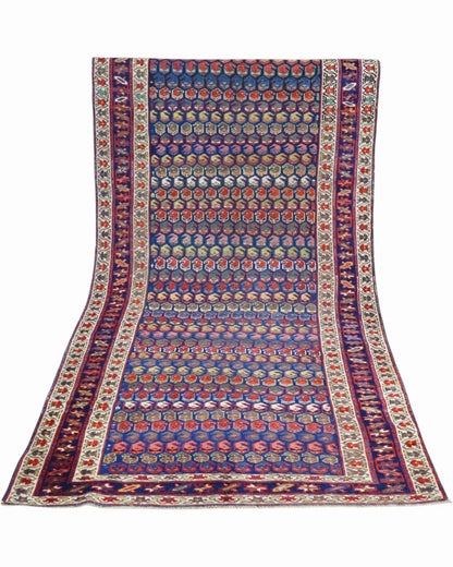Tappeto Caucaso Antico 266x136 cm, tappeto orientale in lana con decorazione geometrica tradizionale.
